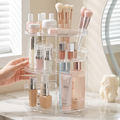 Person tidying a bathroom counter with the 360 rotating vanity organiser