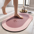 Person stepping onto the quick-dry stone bath mat, feet drying instantly