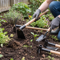 Person gardening with the sturdy garden hand tool set