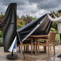 Person covering patio furniture with waterproof covers before rain