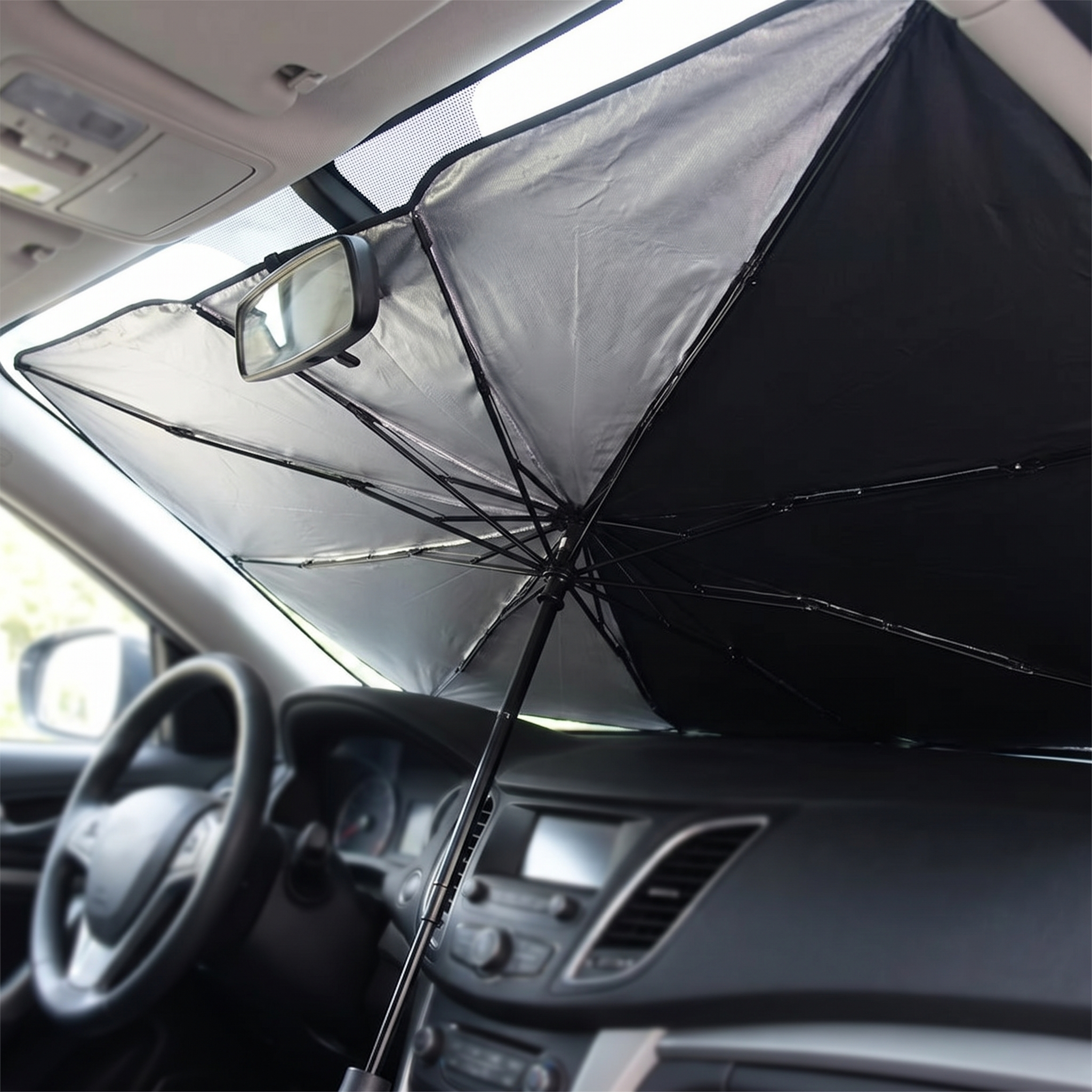 Umbrella sun shade opened across a car windscreen