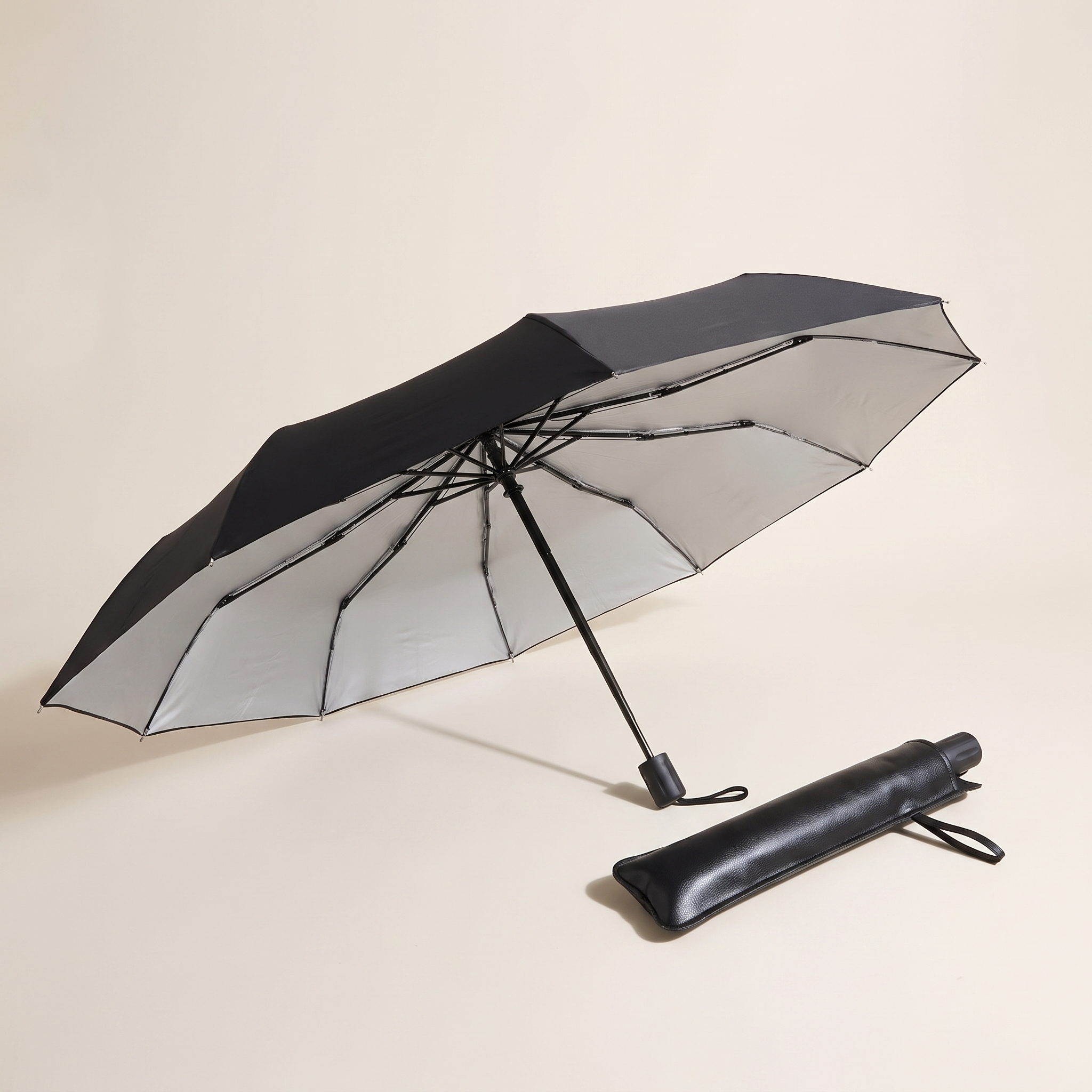 Umbrella-style windshield sun shade product shot